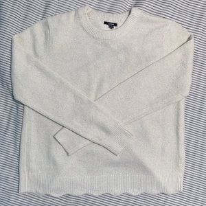 sparkly knit white sweater with cut out back